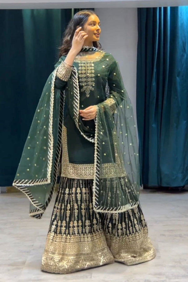 Designer Georgette Sharara suit