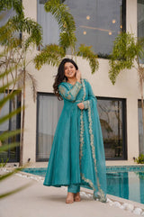 ELEGANT TEAL BLUE ANARKALI SUIT SET WITH GOLDEN EMBROIDERED DUPATTA & SLEEVES