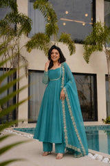 ELEGANT TEAL BLUE ANARKALI SUIT SET WITH GOLDEN EMBROIDERED DUPATTA & SLEEVES